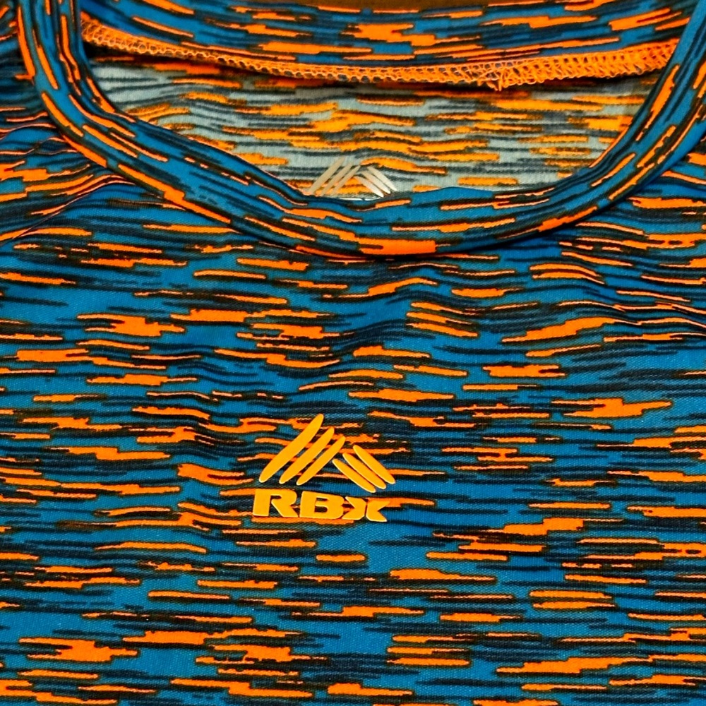 Reebok kids sleeveless size 12 orange and blue